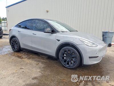 Czwarte zdjęcie samochodu z boku: 2022 TESLA MODEL Y VIN:7SAYGDEE6NF443193 - miniatura