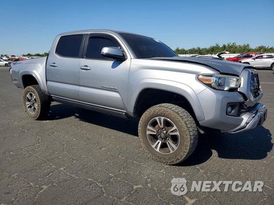 Czwarte zdjęcie samochodu z boku: 2016 TOYOTA TACOMA TRD SPORT VIN:3TMAZ5CN1GM025947 - miniatura