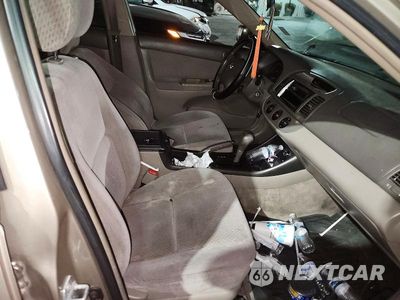 Zdjęcie 13 z 14 samochodu: 2004 TOYOTA CAMRY LE VIN:4T1BE32KX4U315506 - miniatura