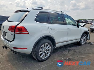 Trzecie zdjęcie samochodu z tyłu: 2014 VOLKSWAGEN TOUAREG V6 TDI VIN:WVGEP9BP0ED007915 - miniatura