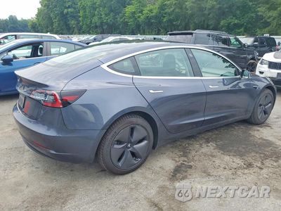 Trzecie zdjęcie samochodu z tyłu: 2019 TESLA MODEL 3 VIN:5YJ3E1EAXKF427017 - miniatura