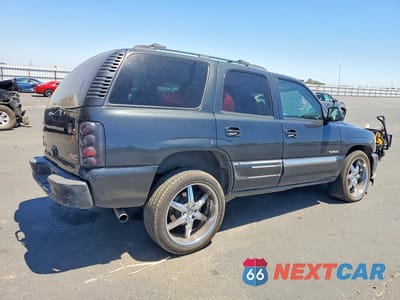 Trzecie zdjęcie samochodu z tyłu: 2003 GMC YUKON VIN:1GKEC13VX3R311711 - miniatura