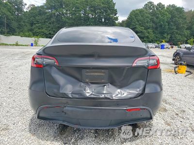Zdjęcie 6 z 13 samochodu: 2021 TESLA MODEL Y VIN:5YJYGDEEXMF125055 - miniatura