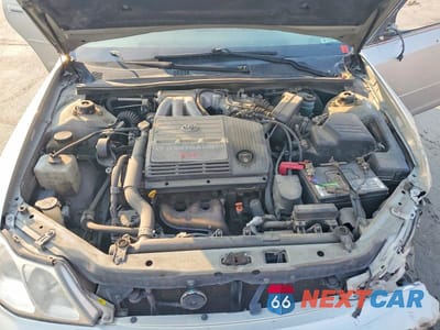 Zdjęcie 11 z 12 samochodu: 2000 TOYOTA AVALON XLS VIN:4T1BF28B1YU097914 - miniatura