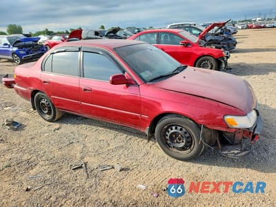 Czwarte zdjęcie samochodu z boku: 1995 TOYOTA COROLLA LE VIN:1NXAE00B4SZ266197 - miniatura
