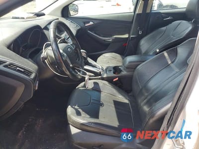 Zdjęcie 7 z 12 samochodu: 2013 FORD FOCUS TITANIUM VIN:1FADP3N23DL141969 - miniatura