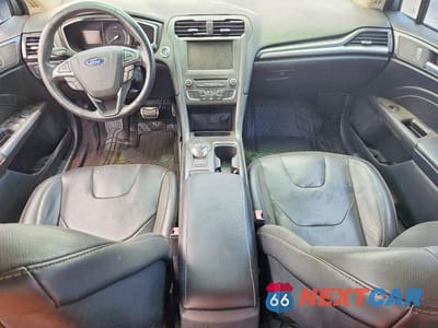 Zdjęcie 8 z 12 samochodu: 2017 FORD FUSION TITANIUM VIN:3FA6P0K91HR266775 - miniatura