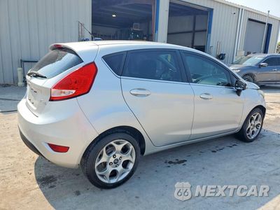 Trzecie zdjęcie samochodu z tyłu: 2011 FORD FIESTA SES VIN:3FADP4FJXBM211393 - miniatura