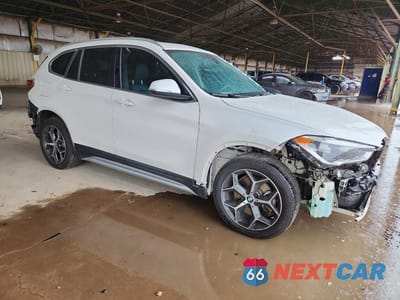 Czwarte zdjęcie samochodu z boku: 2019 BMW X1 SDRIVE28I VIN:WBXHU7C5XK5L11662 - miniatura