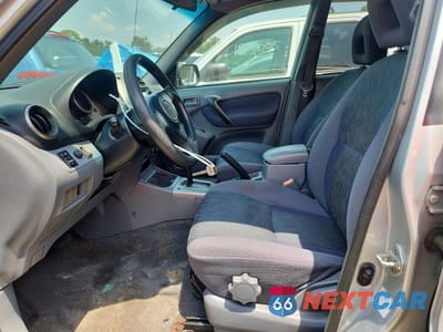 Zdjęcie 7 z 13 samochodu: 2002 TOYOTA RAV4 BASE VIN:JTEGH20V720075324 - miniatura