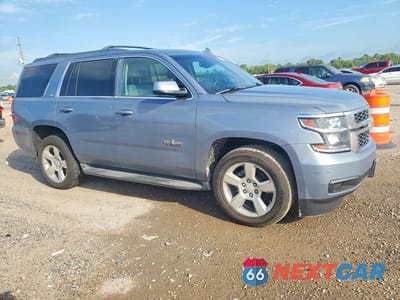 Czwarte zdjęcie samochodu z boku: 2015 CHEVROLET TAHOE C1500 LT VIN:1GNSCBKC1FR729400 - miniatura