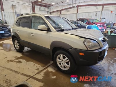 Czwarte zdjęcie samochodu z boku: 2007 HYUNDAI TUCSON SE/LIMITED VIN:KM8JN12D67U636139 - miniatura