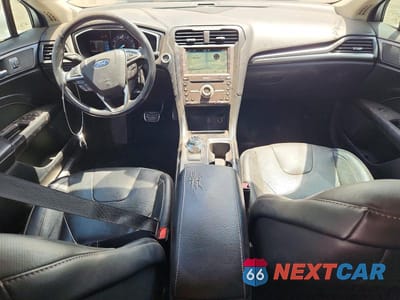 Zdjęcie 8 z 12 samochodu: 2018 FORD FUSION TITANIUM/PLATINUM VIN:3FA6P0D91JR123859 - miniatura