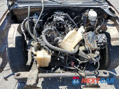 Zdjęcie 12 z 13 samochodu: 2003 CHEVROLET TAHOE C1500 VIN:1GNEC13T03R133065 - miniatura