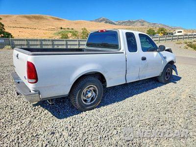 Trzecie zdjęcie samochodu z tyłu: 2002 FORD F150 VIN:1FTRX17WX2NB10952 - miniatura