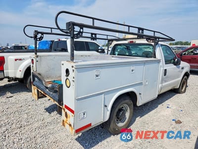 Trzecie zdjęcie samochodu z tyłu: 2003 FORD F250 SUPER DUTY VIN:1FDNF20L43EC90823 - miniatura