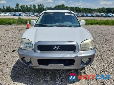Piąte zdjęcie samochodu w środku: 2004 HYUNDAI SANTA FE GLS VIN:KM8SC13D74U699528 - miniatura
