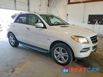 Czwarte zdjęcie samochodu z boku: 2012 MERCEDES-BENZ ML 350 4MATIC VIN:4JGDA5HB4CA075165 - miniatura