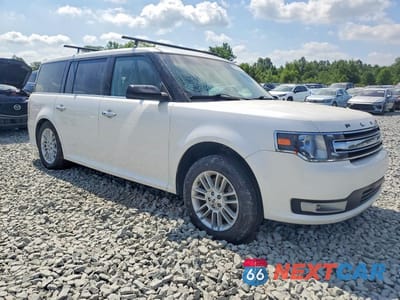 Czwarte zdjęcie samochodu z boku: 2015 FORD FLEX SEL VIN:2FMGK5C82FBA19448 - miniatura