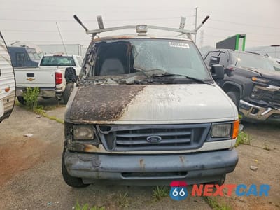 Piąte zdjęcie samochodu w środku: 2004 FORD ECONOLINE E350 SUPER DUTY VAN VIN:1FTSE34L84HA14946 - miniatura
