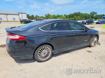 Trzecie zdjęcie samochodu z tyłu: 2014 FORD FUSION TITANIUM HEV VIN:3FA6P0RU1ER295909 - miniatura