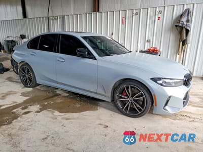 Czwarte zdjęcie samochodu z boku: 2023 BMW 330XI VIN:3MW89FF0XP8D66502 - miniatura