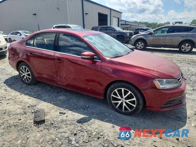 Czwarte zdjęcie samochodu z boku: 2017 VOLKSWAGEN JETTA SE VIN:3VWDB7AJ2HM336878 - miniatura