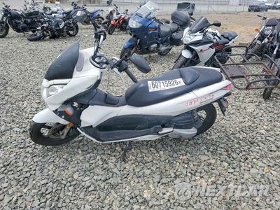 Trzecie zdjęcie samochodu z tyłu: 2011 HONDA PCX VIN:MLHJF2807B5001491 - miniatura
