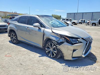 Czwarte zdjęcie samochodu z boku: 2017 LEXUS RX 350 BASE VIN:2T2ZZMCA2HC066863 - miniatura