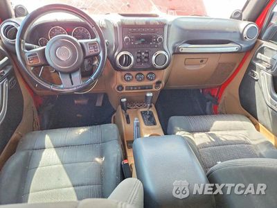 Zdjęcie 8 z 12 samochodu: 2011 JEEP WRANGLER UNLIMITED SAHARA VIN:1J4HA5H1XBL534497 - miniatura