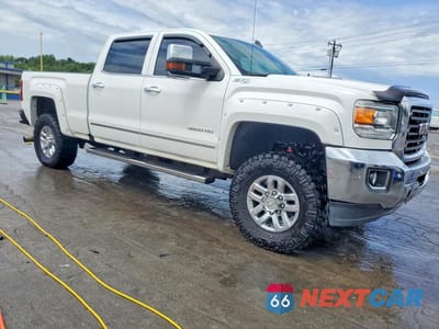 Czwarte zdjęcie samochodu z boku: 2016 GMC SIERRA K3500 SLT VIN:1GT42XC89GF257557 - miniatura