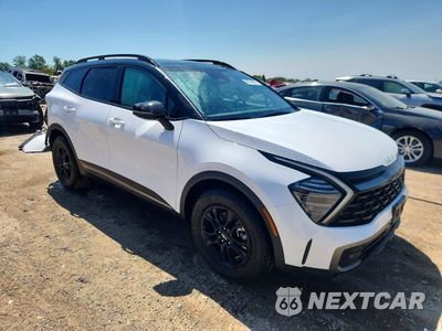 Czwarte zdjęcie samochodu z boku: 2024 KIA SPORTAGE X-PRO VIN:5XYK7CDF3RG198780 - miniatura
