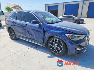 Czwarte zdjęcie samochodu z boku: 2020 BMW X1 SDRIVE28I VIN:WBXJG7C01L5R91921 - miniatura
