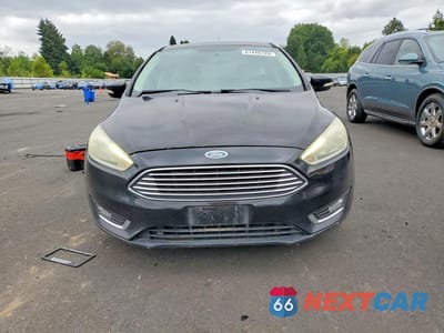 Piąte zdjęcie samochodu w środku: 2015 FORD FOCUS TITANIUM VIN:1FADP3N22FL222111 - miniatura
