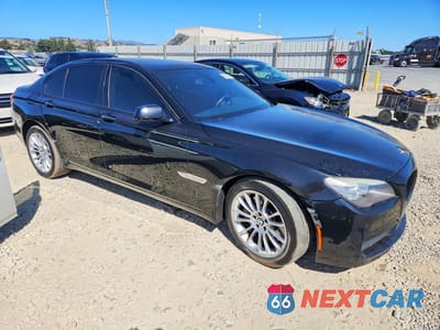 Czwarte zdjęcie samochodu z boku: 2010 BMW 750 I VIN:WBAKA8C52ACY36000 - miniatura