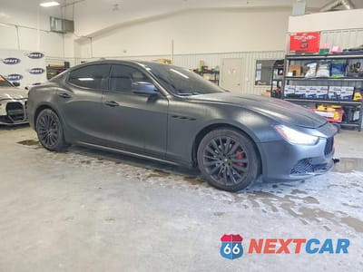 Czwarte zdjęcie samochodu z boku: 2016 MASERATI GHIBLI VIN:ZAM57XSAXG1176263 - miniatura