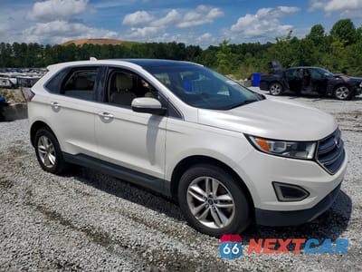 Czwarte zdjęcie samochodu z boku: 2015 FORD EDGE SEL VIN:2FMTK4J85FBC14844 - miniatura
