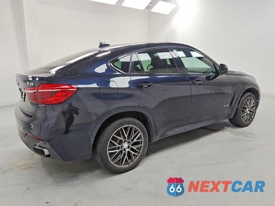 Trzecie zdjęcie samochodu z tyłu: 2015 BMW X6 XDRIVE35I VIN:5UXKU2C50F0F96088 - miniatura
