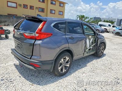 Trzecie zdjęcie samochodu z tyłu: 2018 HONDA CR-V LX VIN:2HKRW5H37JH402605 - miniatura