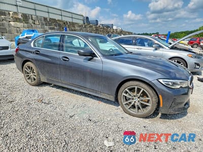 Czwarte zdjęcie samochodu z boku: 2019 BMW 330XI VIN:WBA5R7C51KFH20399 - miniatura