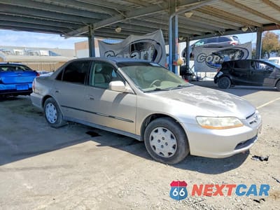 Czwarte zdjęcie samochodu z boku: 1999 HONDA ACCORD LX VIN:JHMCG6656XC012577 - miniatura