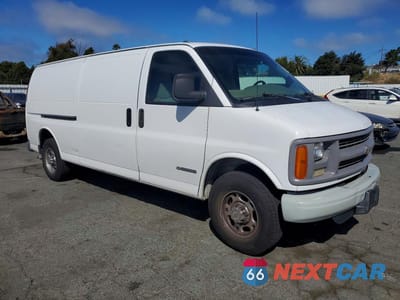 Czwarte zdjęcie samochodu z boku: 2001 CHEVROLET EXPRESS G2500 VIN:1GCGG29R011141279 - miniatura