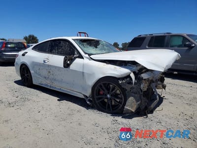 Czwarte zdjęcie samochodu z boku: 2022 BMW M440I VIN:WBA83AP01NCL00591 - miniatura
