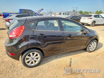 Trzecie zdjęcie samochodu z tyłu: 2013 FORD FIESTA SE VIN:3FADP4EJ7DM130713 - miniatura