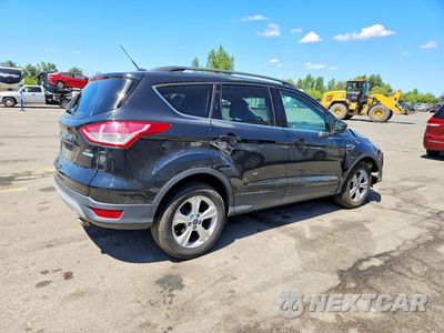 Trzecie zdjęcie samochodu z tyłu: 2014 FORD ESCAPE SE VIN:1FMCU0GX3EUD56698 - miniatura
