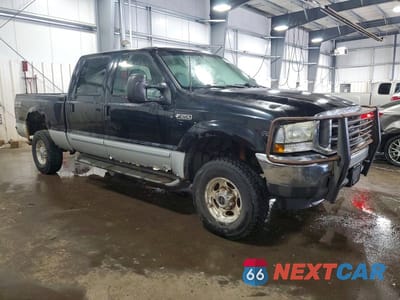 Czwarte zdjęcie samochodu z boku: 2002 FORD F250 SUPER DUTY VIN:1FTNW21SX2EB15078 - miniatura