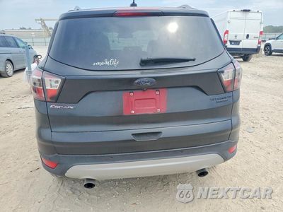 Zdjęcie 6 z 13 samochodu: 2017 FORD ESCAPE TITANIUM VIN:1FMCU9JD4HUA08139 - miniatura