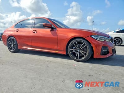 Czwarte zdjęcie samochodu z boku: 2021 BMW 330I VIN:3MW5R1J0XM8B52425 - miniatura
