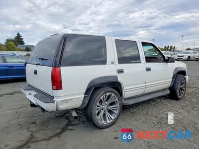 Trzecie zdjęcie samochodu z tyłu: 1997 GMC YUKON VIN:1GKEK13RXVJ715096 - miniatura