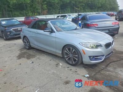 Czwarte zdjęcie samochodu z boku: 2015 BMW 228 I VIN:WBA1K5C51FV242615 - miniatura